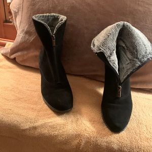 Beautiful pair of black booties. Heel size is 3 inches